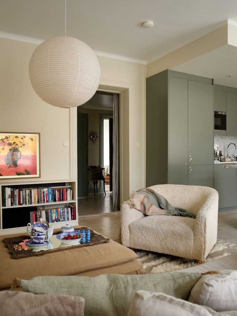 A beige living room with a neutral color palette in the decor